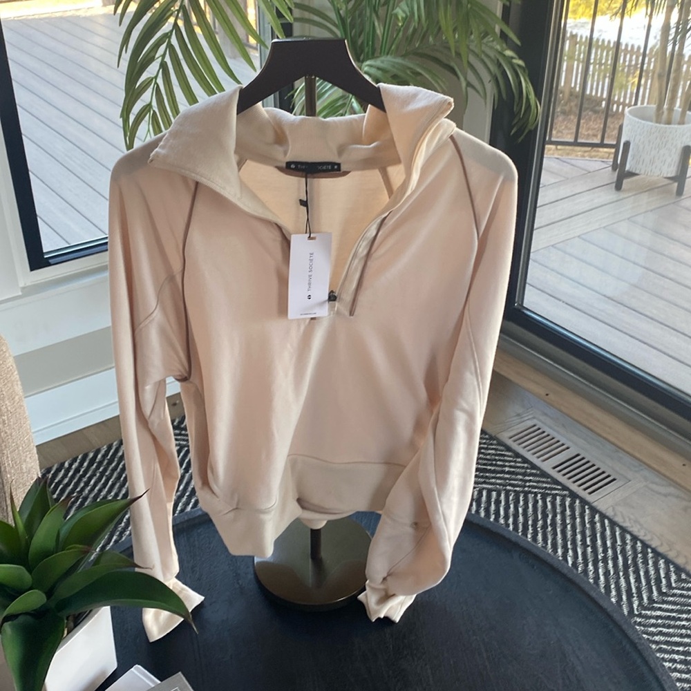 Thrive Societe Quarter Zip Top
Color: Cream
Size: M
NWT